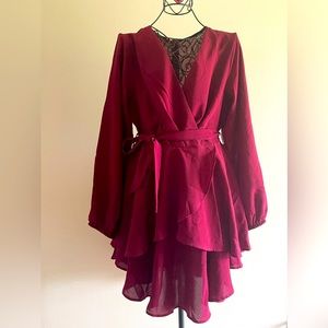 Burgundy mini dress. Deep v neck.